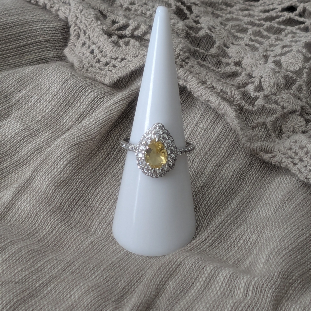 Elegant Silver and Yellow Gemstone Ring